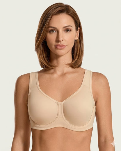 Front view of Formiva outside-wire high impact sports bra in nude providing max control for large busts.
