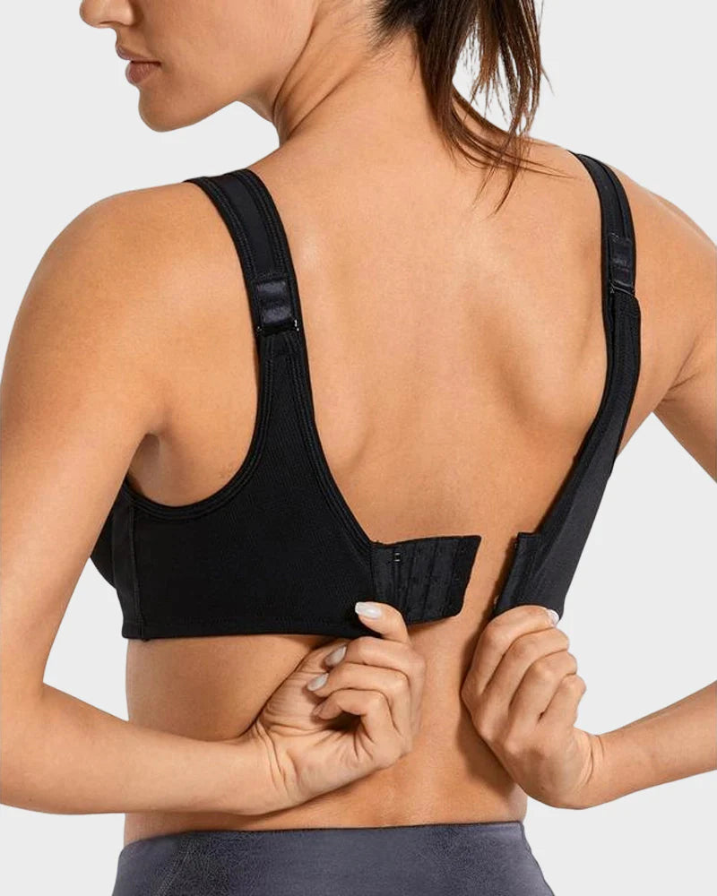 Wide cushioned straps and secure back closure on Formiva high impact sports bra for maximum stability during workouts.